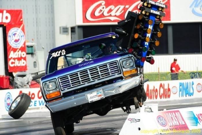 Tree Removal by a Stock Eliminator Dodge Pickup